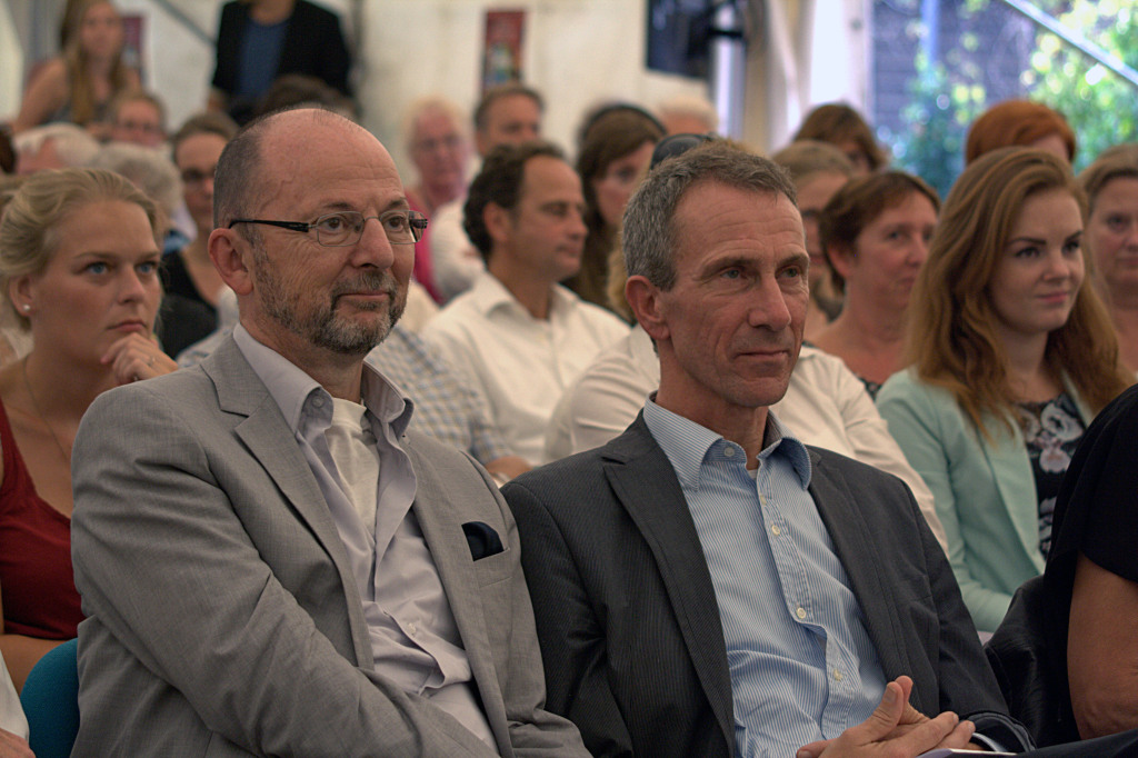 The keynote speaker from the University of Utrecht, Paul Schnabel (left, front row), and next to him the present Dean Henk Kiers. Behind Schnabel sits Fionneke Bos (left), the research master student commenting on his lecture.